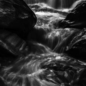 Running Stream - Black and White Photograph of Waterfall in Limited Edition Pigment Prints on Canvas and Matte Paper by Minhajul Haque