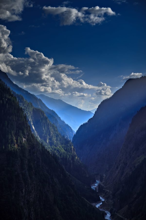 Sunlit Mountain Cliffs - Landscape Photograph in Museum-Quality Limited Edition Archival Pigment Prints on Canvas and Matte Paper by Minhajul Haque